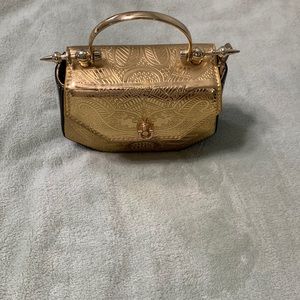 Gold and black bag